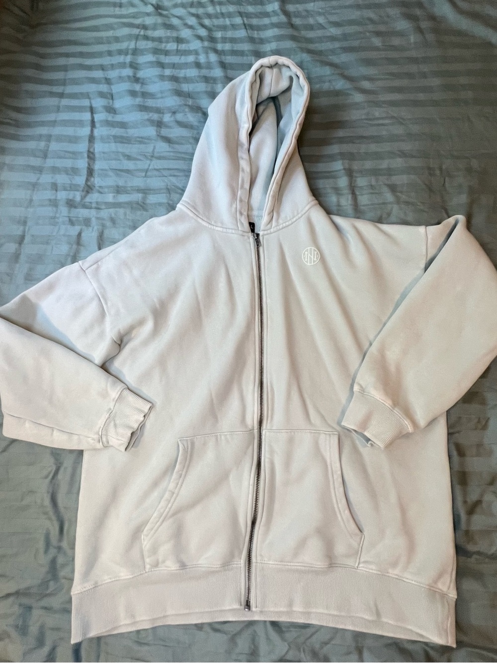 Women's Light Blue Full-Zip Hoodie with Subtle Logo